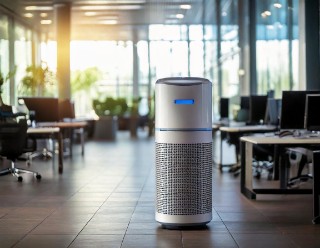 : The picture shows an air purifier in an office.